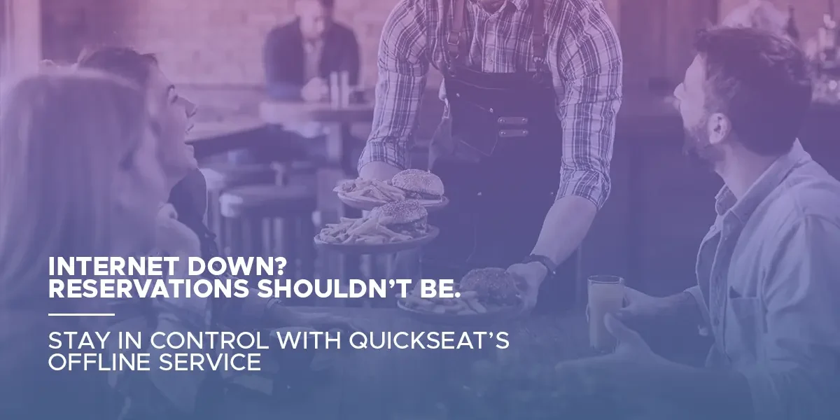 Restaurant staff using QuickSeat’s offline reservation system to manage bookings during internet outage and keep operations running smoothly