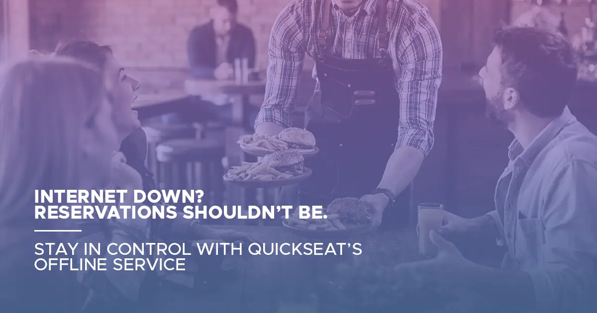 Restaurant staff using QuickSeat’s offline reservation system to manage bookings during internet outage and keep operations running smoothly