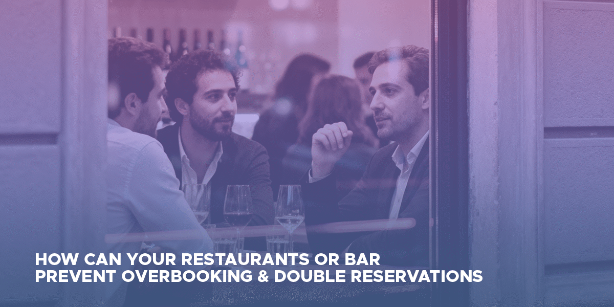 people dining in a bar discussing reservation management software