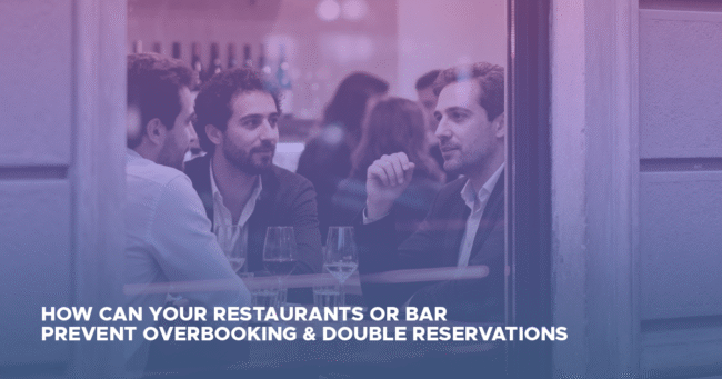 people dining in a bar discussing reservation management software